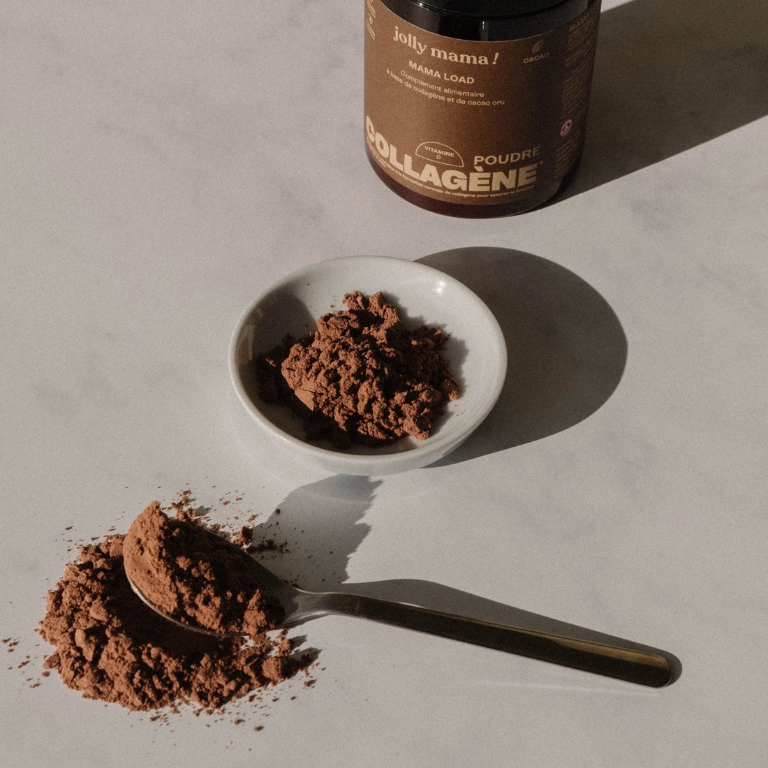 Poudre Mama Load Jolly Mama au collagène et cacao cru – à diluer pour un soutien nutritionnel quotidien